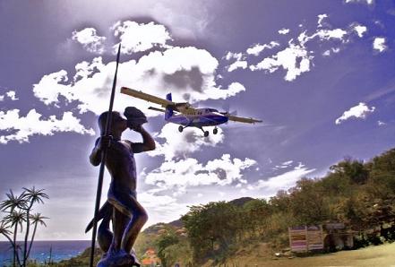 Landing in St. Barths over Arawak statue